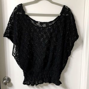 Free people black crochet top. Tag cut off but still gorgeous.
